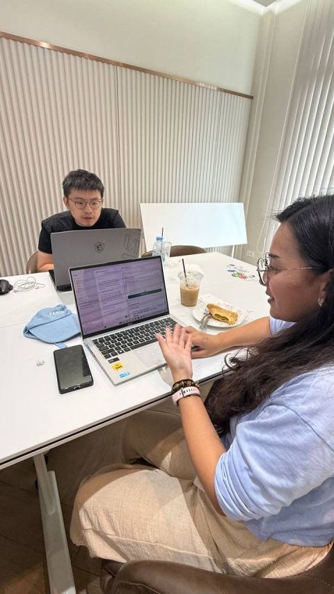 Participants discussing an automation workflow during the hands-on Codex challenge